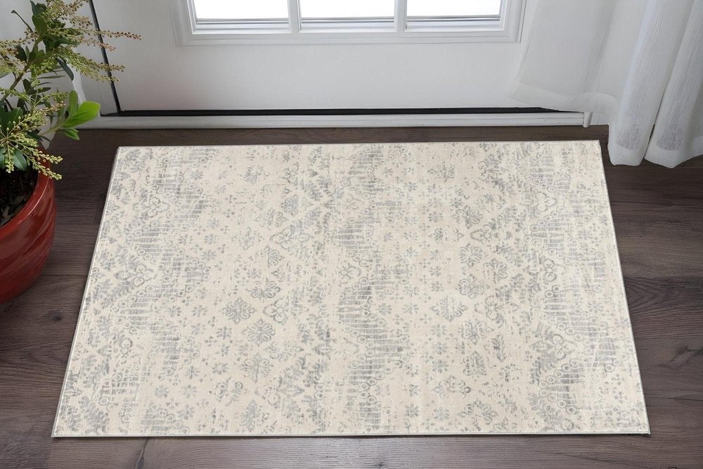 8' X 11' Ivory Distressed Ikat Pattern Area Rug