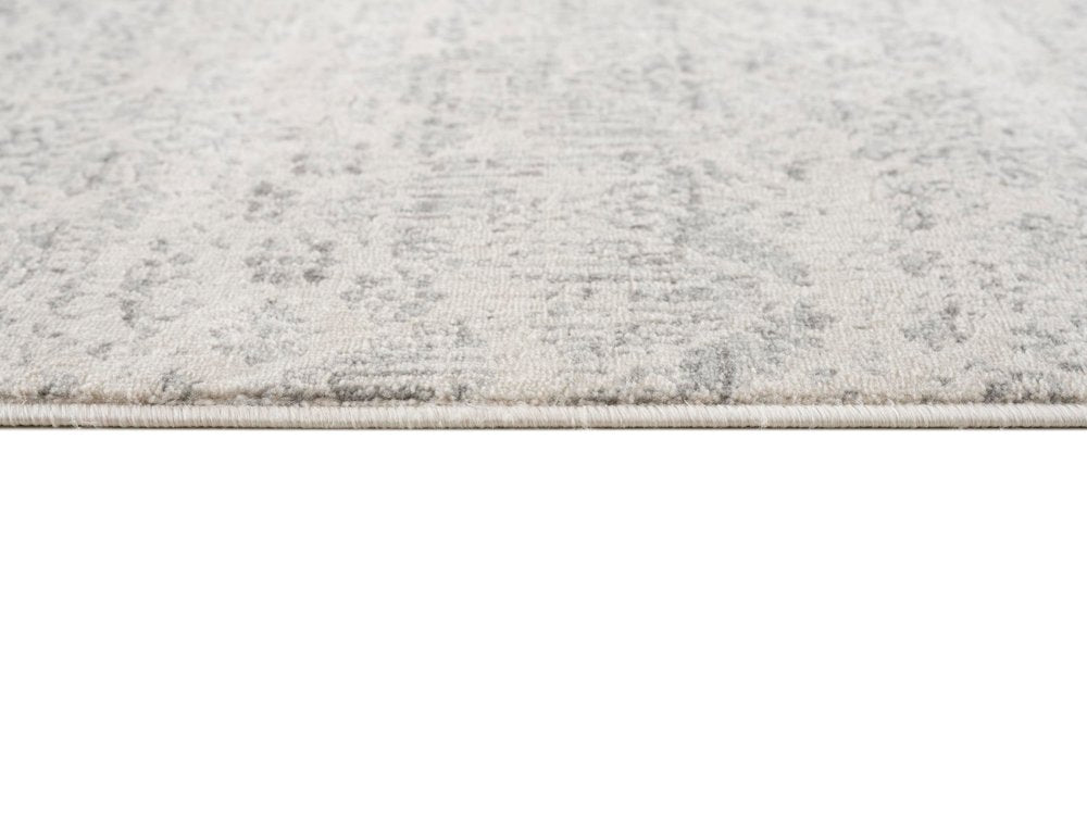 8' X 11' Ivory Distressed Ikat Pattern Area Rug