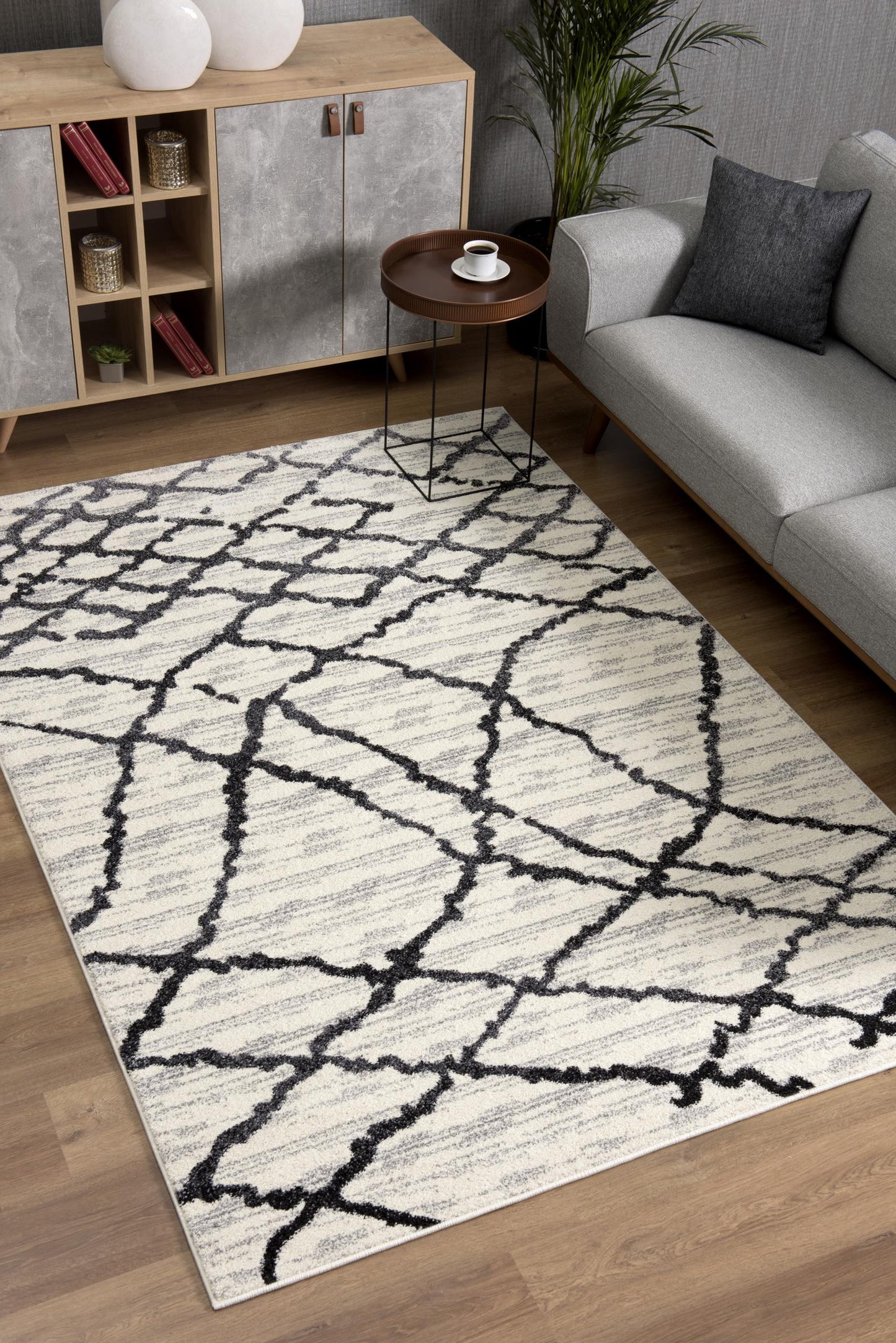 5' X 8' Gray And Black Modern Abstract Area Rug