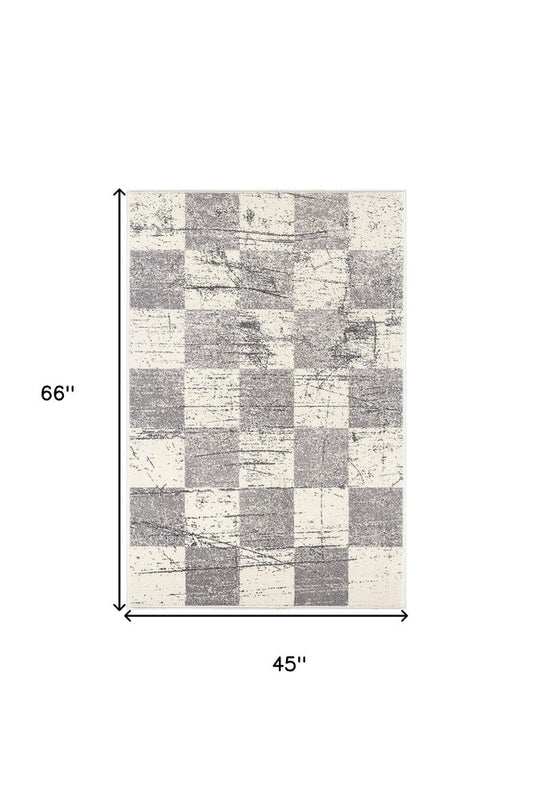 5' X 8' White And Gray Checkered Area Rug