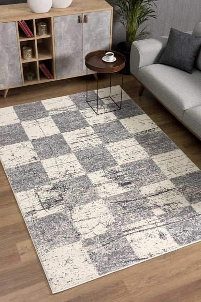 5' X 8' White And Gray Checkered Area Rug