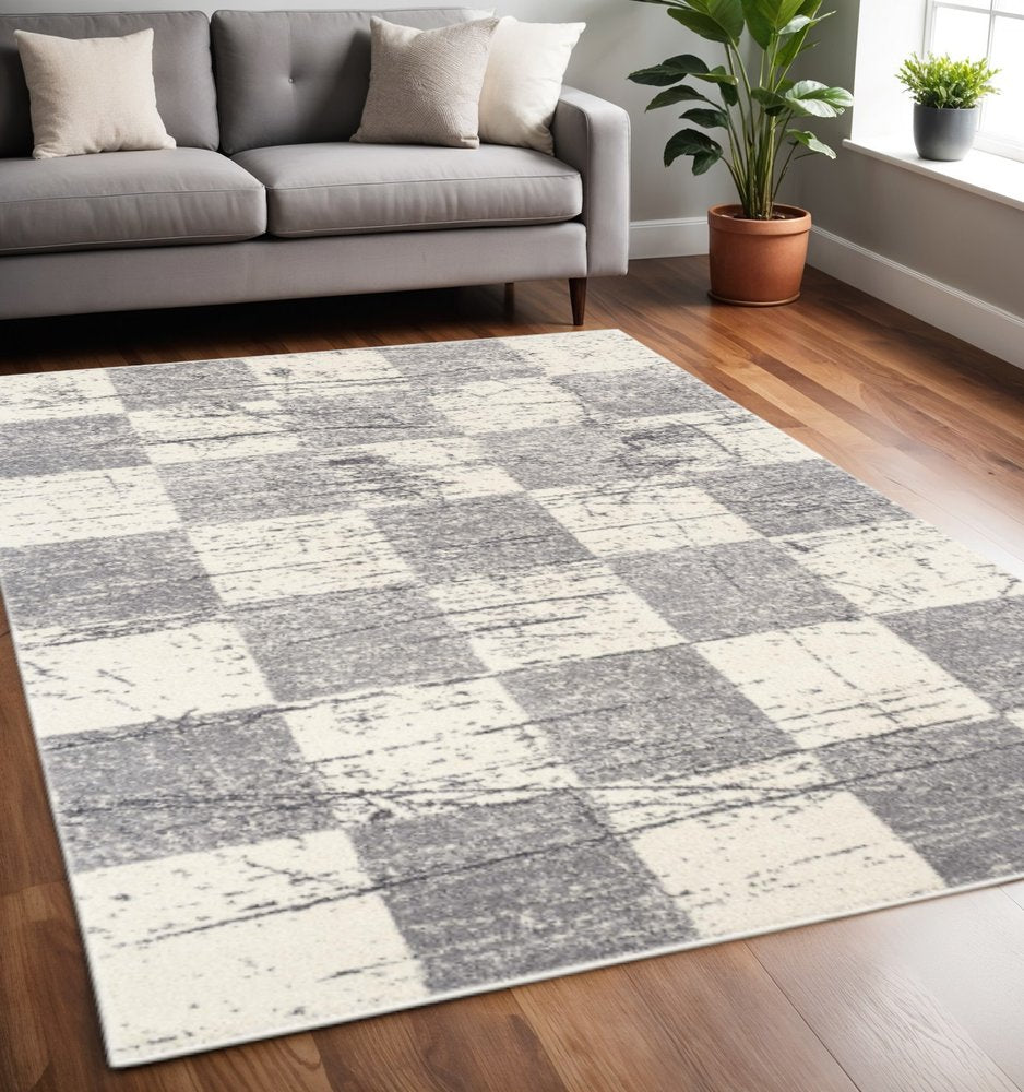 5' X 8' White And Gray Checkered Area Rug