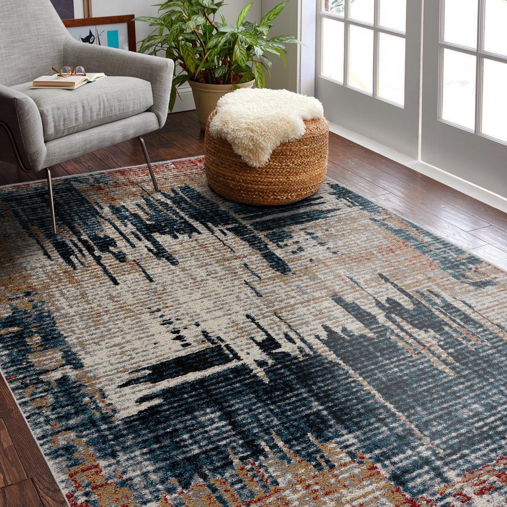 8' X 11' Blue And Ivory Abstract Area Rug