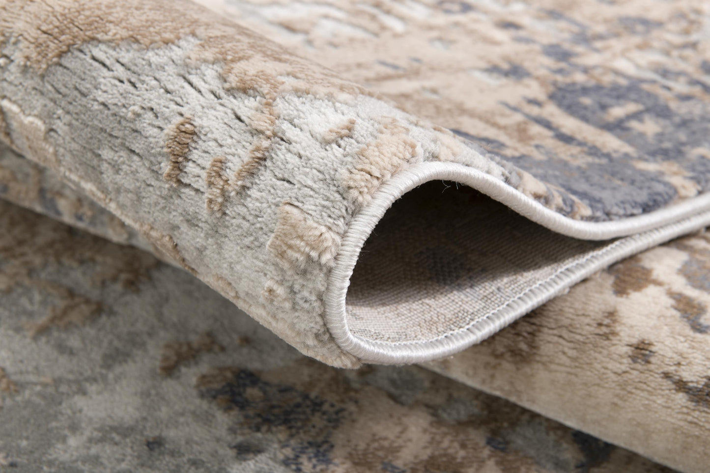 4' X 6' Beige And Ivory Abstract Area Rug