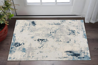 5' X 8' Blue And Ivory Abstract Strokes Area Rug