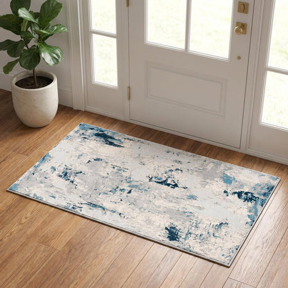 5' X 8' Blue And Ivory Abstract Strokes Area Rug