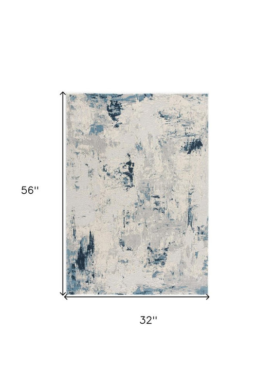 5' X 8' Blue And Ivory Abstract Strokes Area Rug