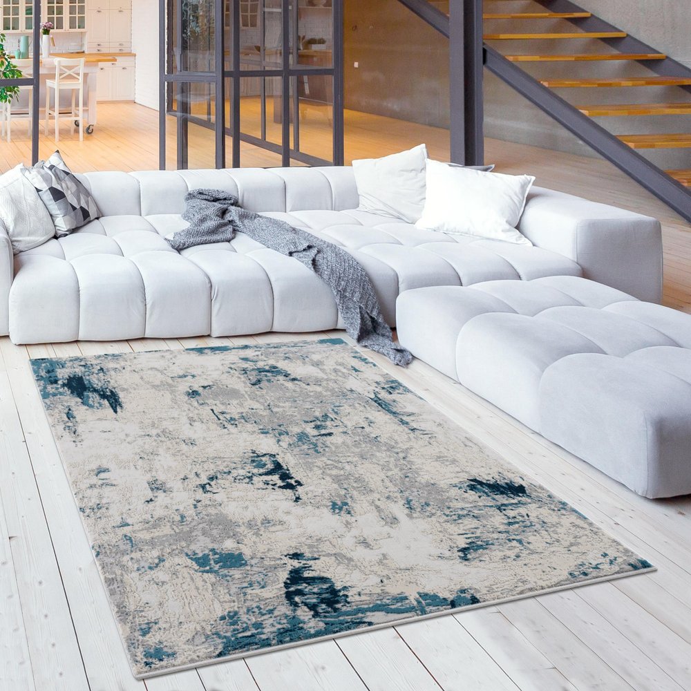 5' X 8' Blue And Ivory Abstract Strokes Area Rug