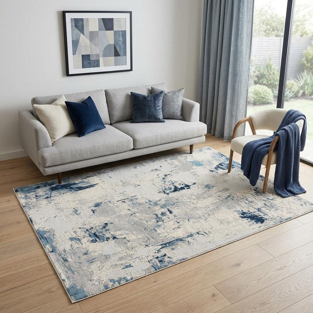 5' X 8' Blue And Ivory Abstract Strokes Area Rug