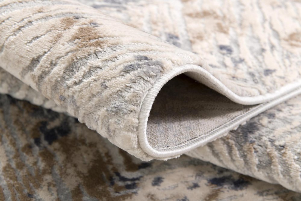 5' X 8' Ivory And Beige Abstract Diamonds Area Rug