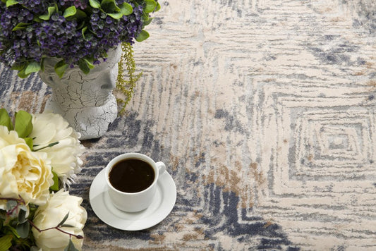 5' X 8' Ivory And Beige Abstract Diamonds Area Rug