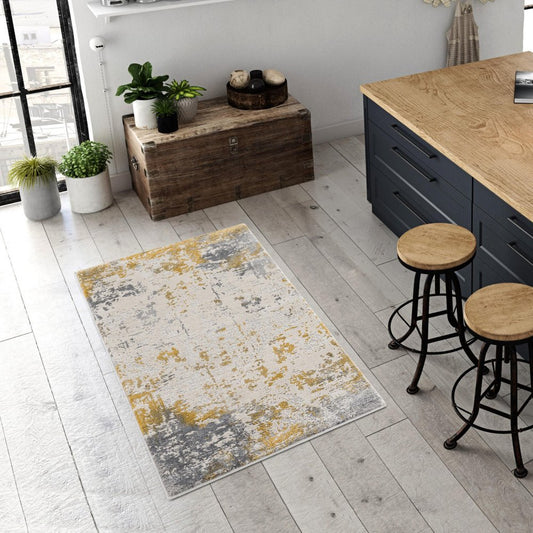5' X 7' Gold And Gray Abstract Distressed Area Rug