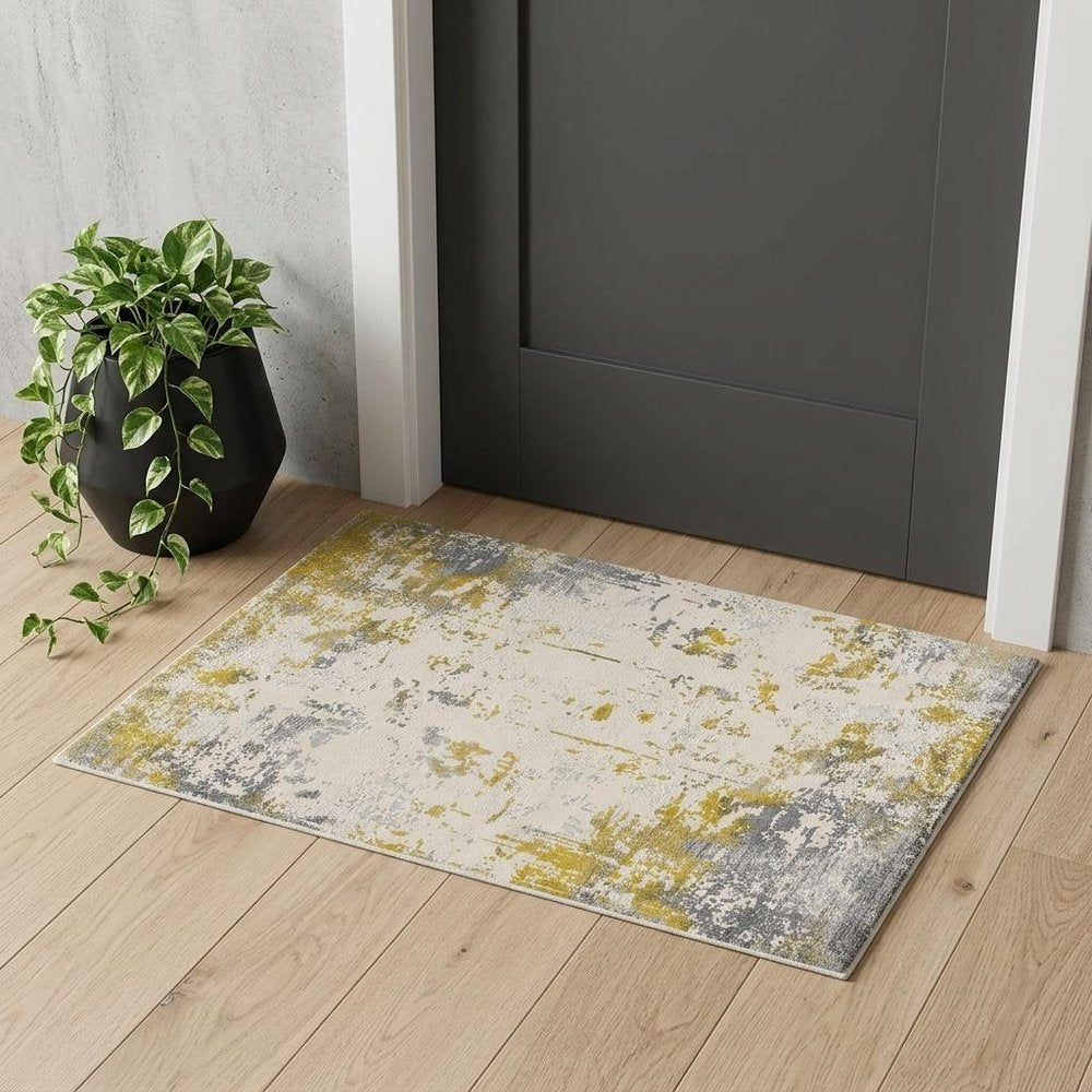 5' X 7' Gold And Gray Abstract Distressed Area Rug