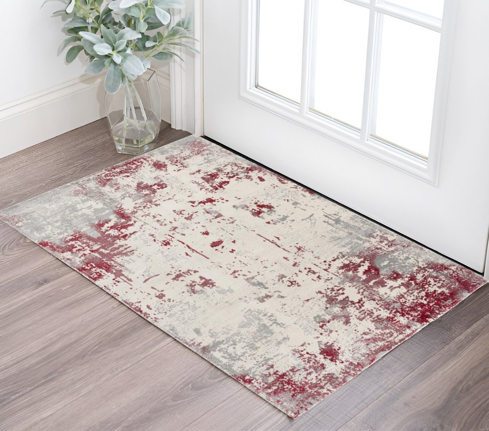 6' X 9' Ivory Red and Gray Abstract Area Rug