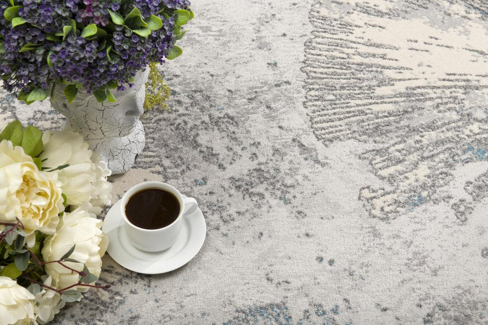 7' X 10' Blue Abstract Circular Motifs Area Rug