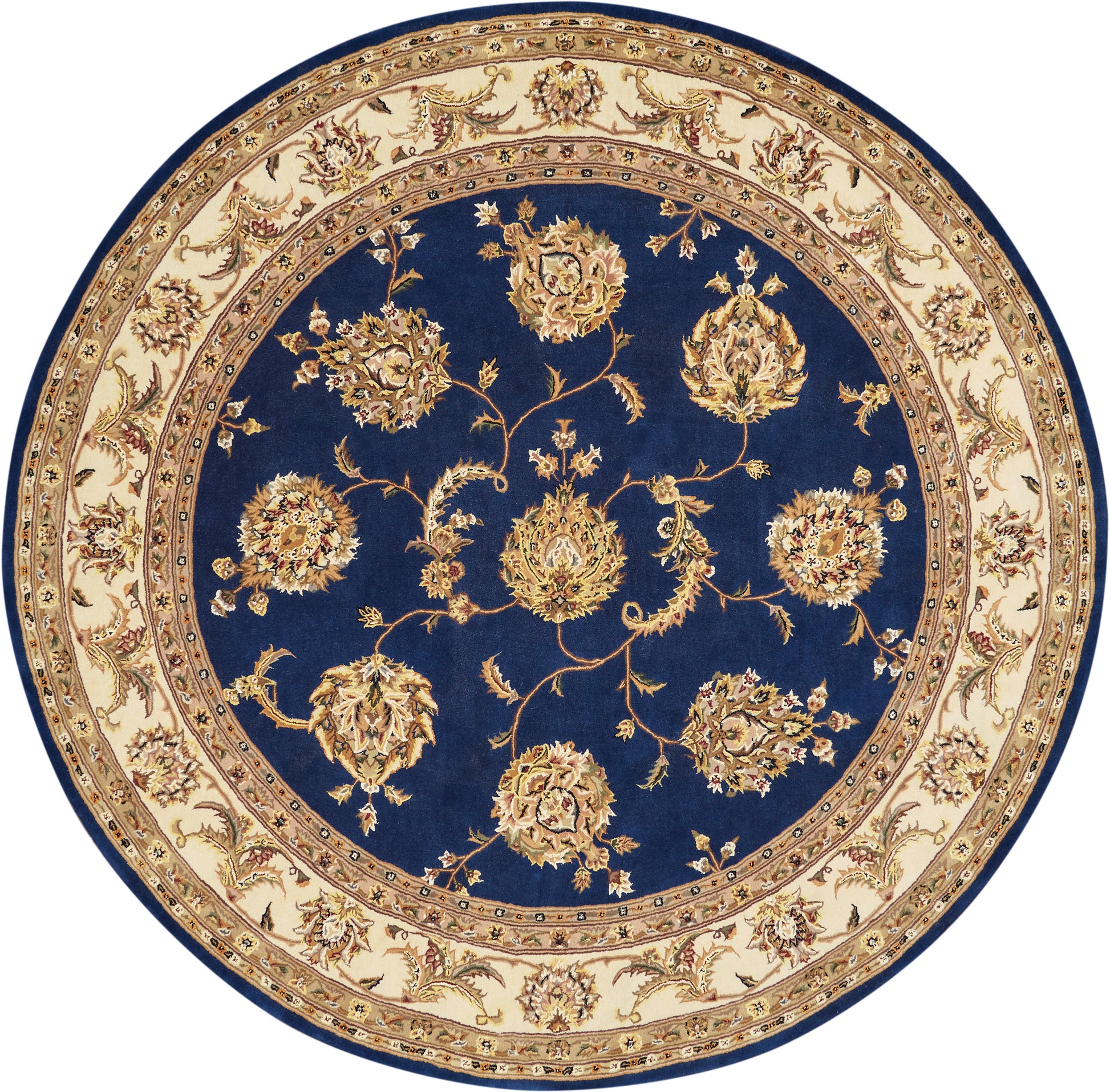 Round Persian-style rug: navy center with gold floral vines, ornate beige border.