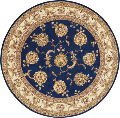 Round Persian-style rug: navy center with gold floral vines, ornate beige border.