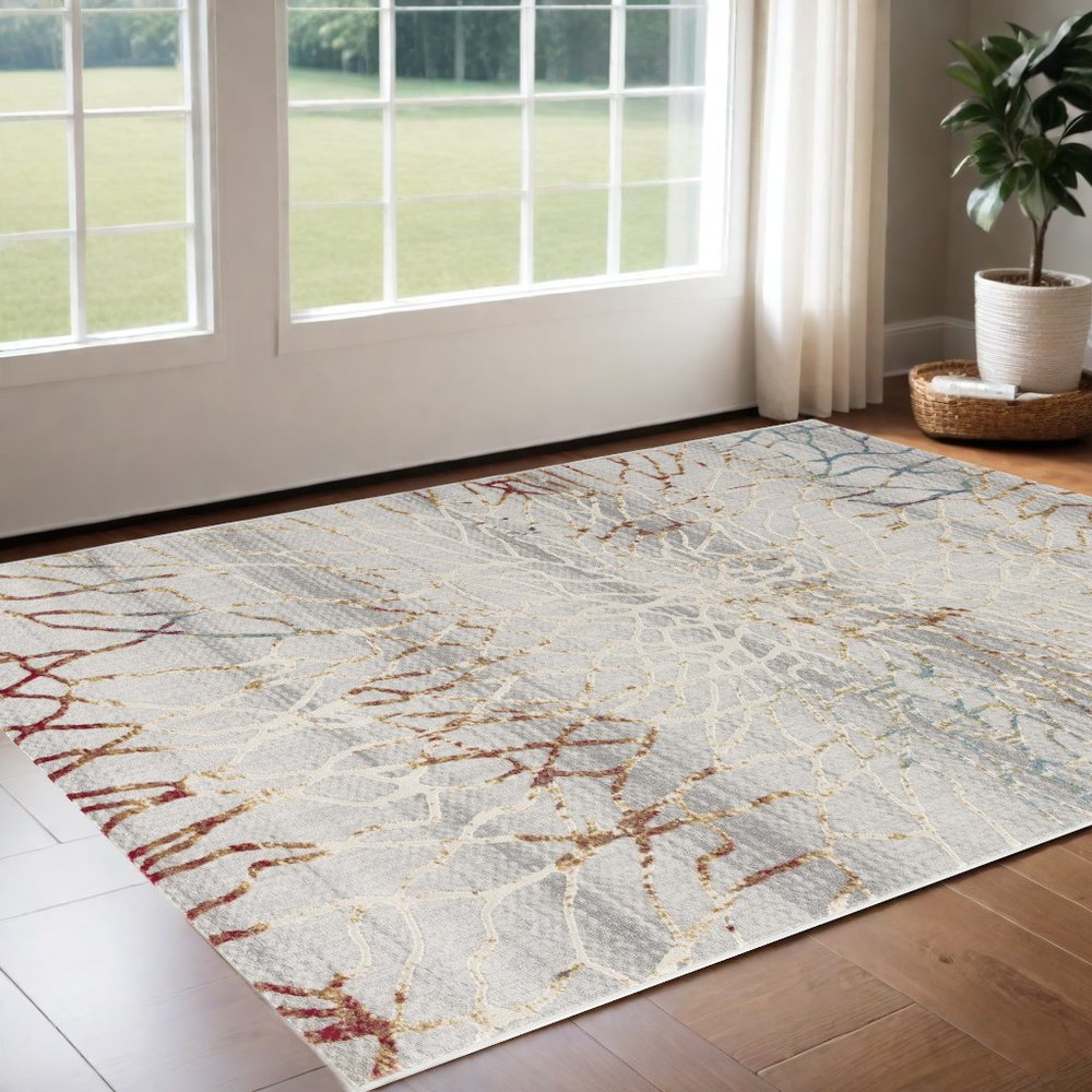 5' X 8' Gold And Ivory Abstract Branches Area Rug