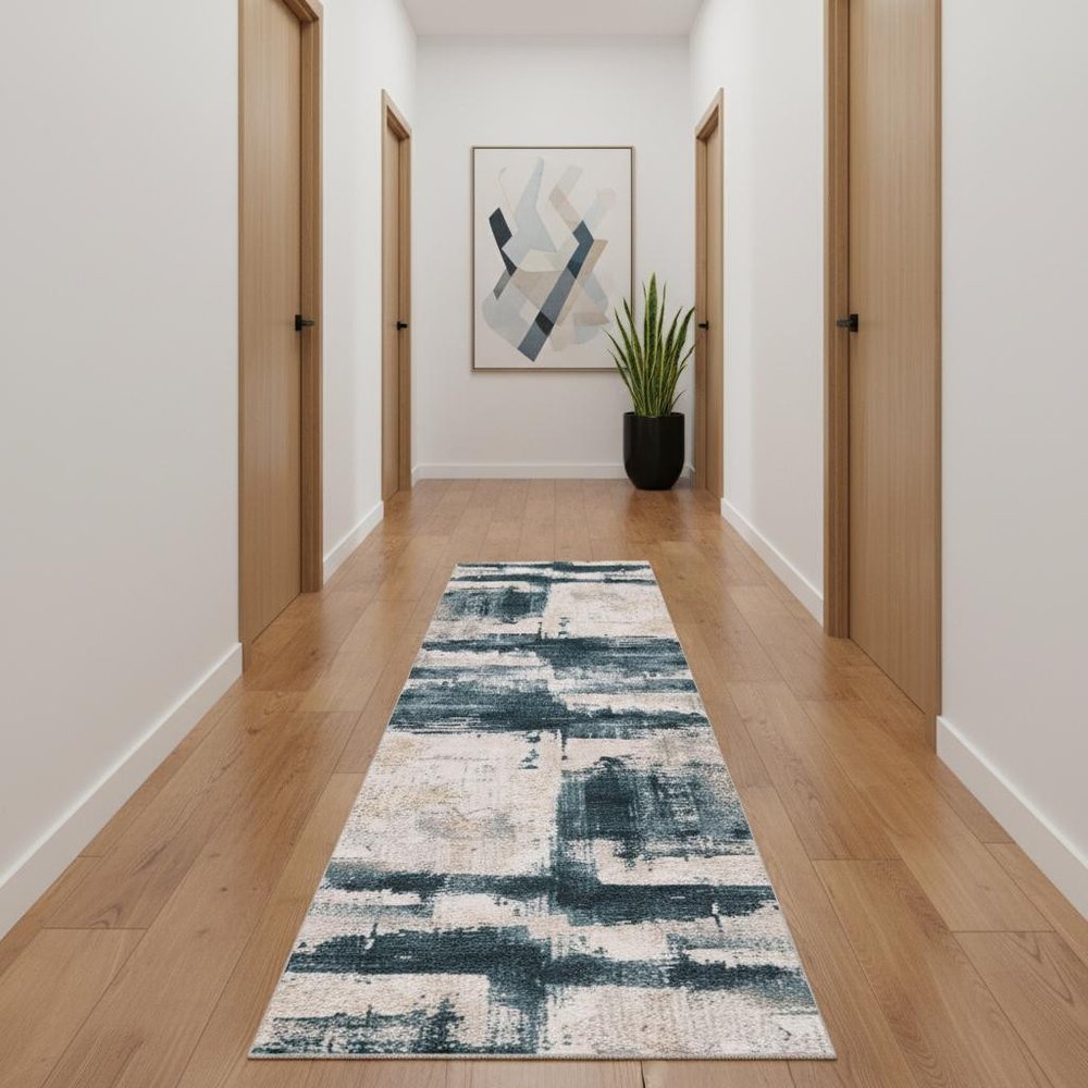 5' X 7' Blue And Ivory Abstract Dhurrie Area Rug