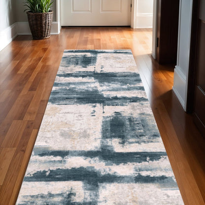 6' X 9' Blue And Ivory Abstract Dhurrie Area Rug