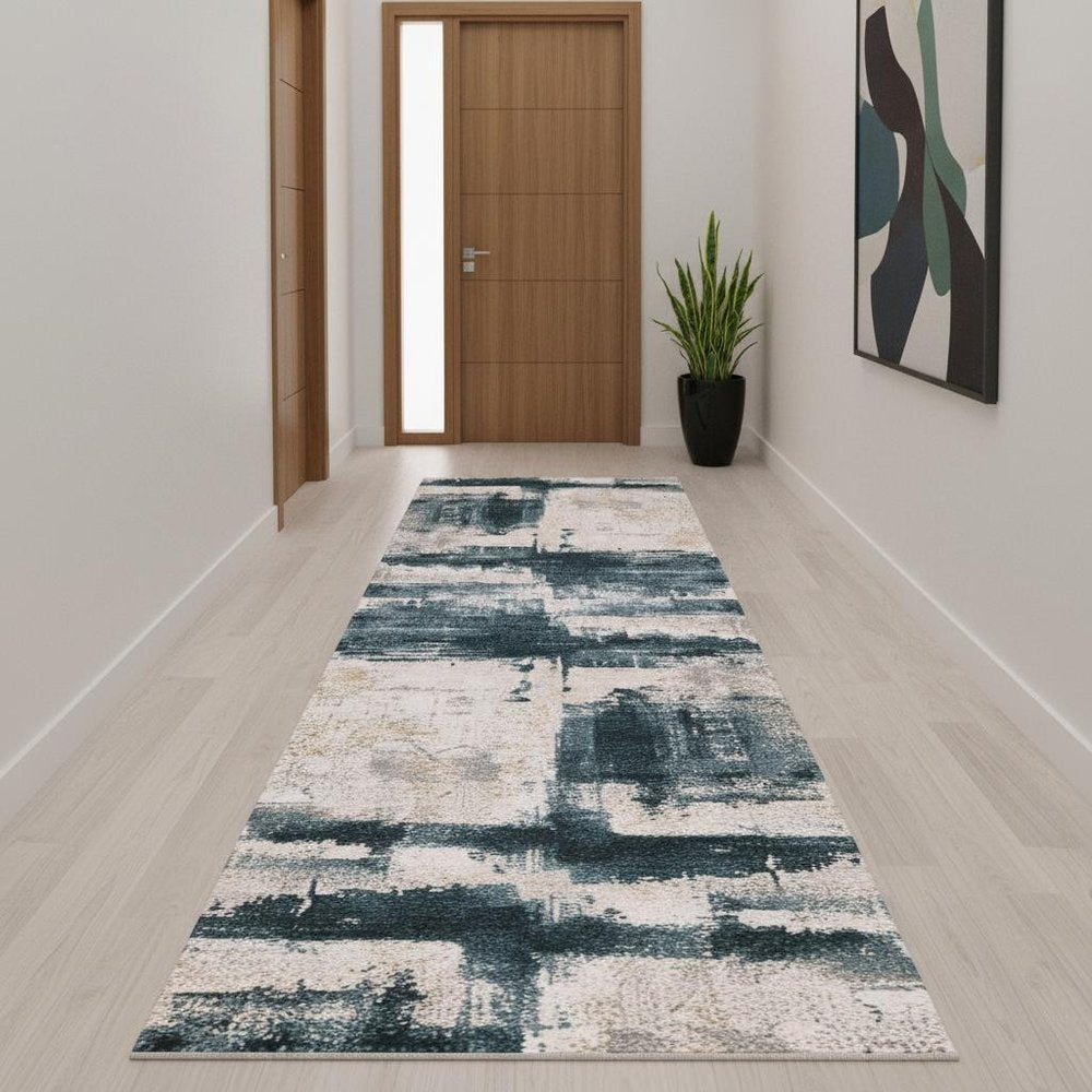 6' X 9' Blue And Ivory Abstract Dhurrie Area Rug