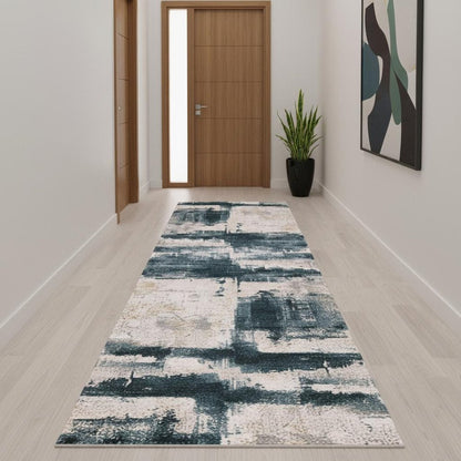 6' X 9' Blue And Ivory Abstract Dhurrie Area Rug