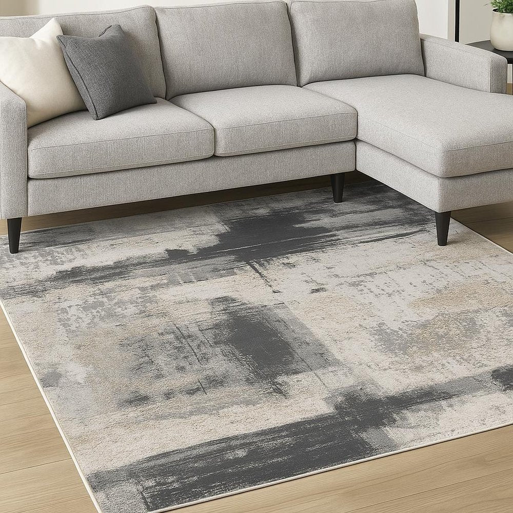 5' X 7' Gray And Ivory Abstract Dhurrie Area Rug