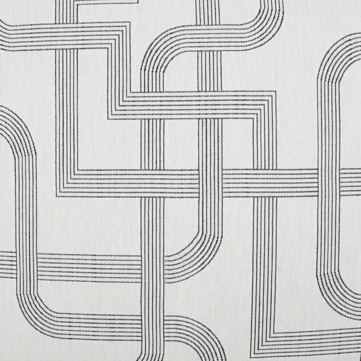Light grey fabric with dark grey interlocking linear geometric pattern; modern upholstery textile.