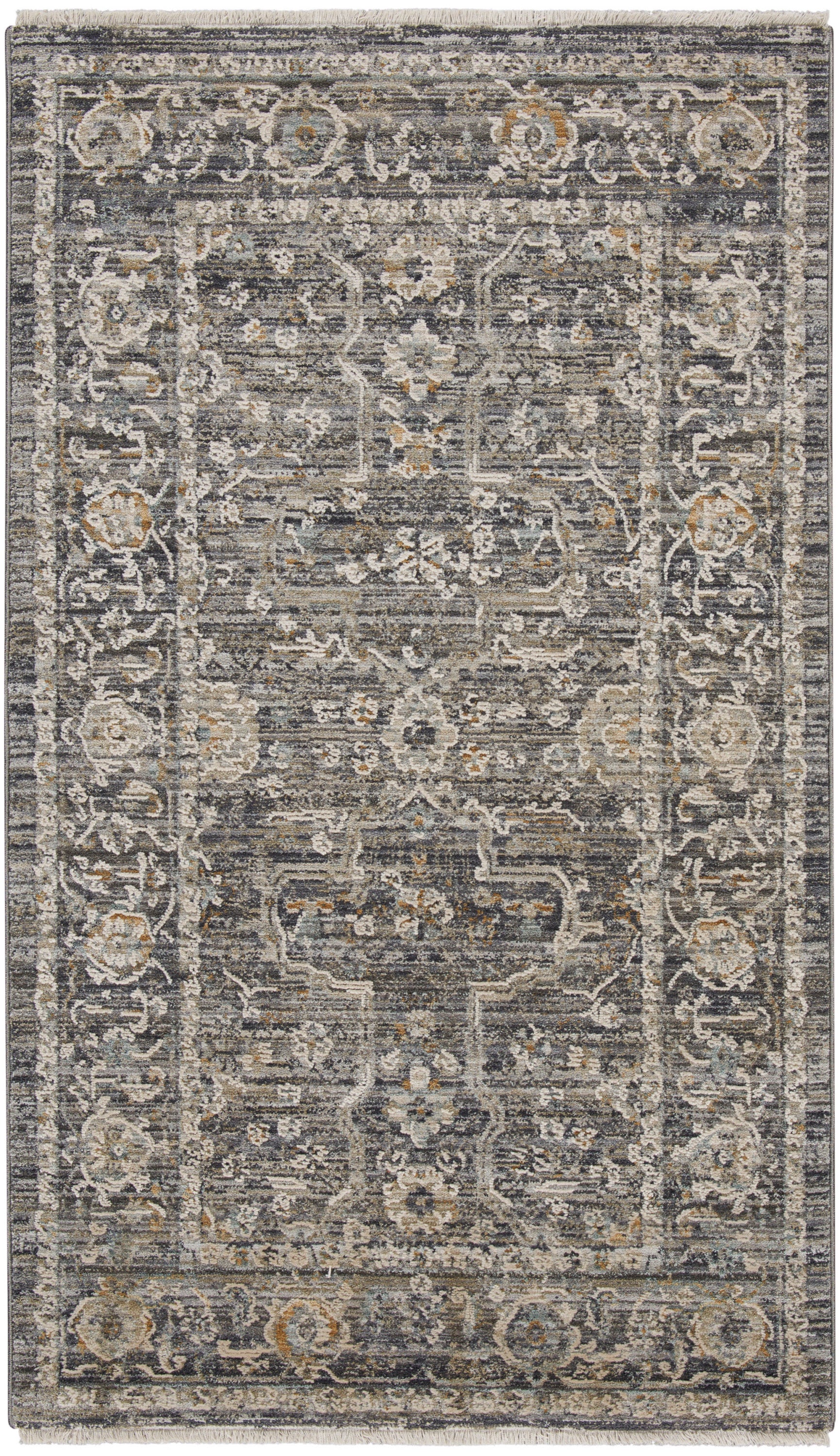 Distressed gray-blue area rug with ivory floral border and medallion pattern, fringe edges, rectangular.