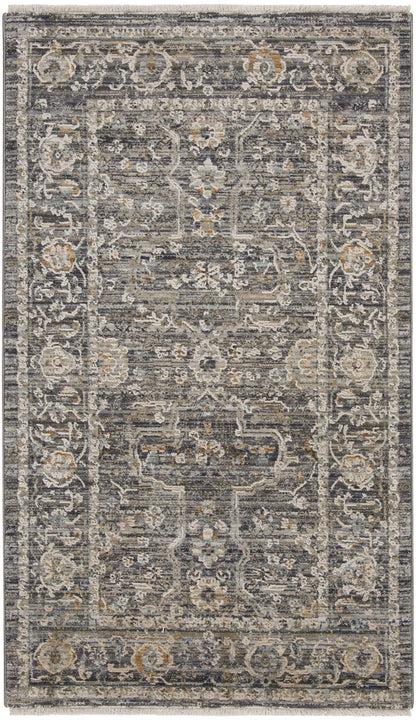 Distressed gray-blue area rug with ivory floral border and medallion pattern, fringe edges, rectangular.