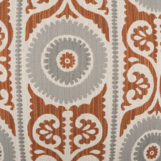 Rust-orange and gray damask patterned fabric with circular medallions and scrolling florals, upholstery textile.