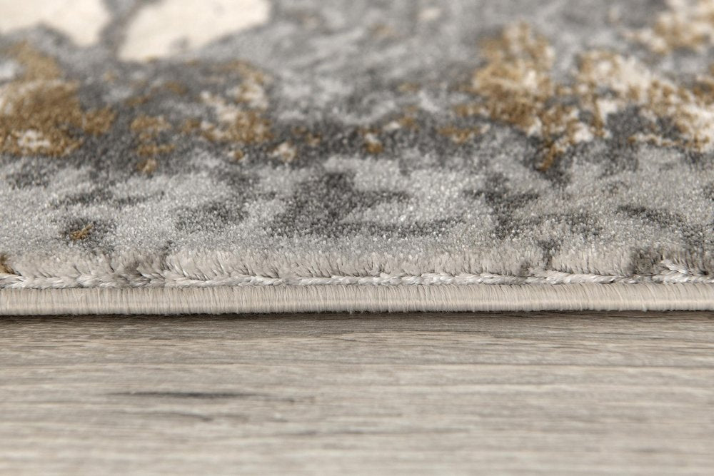 7' X 10' Beige And Gray Distressed Area Rug