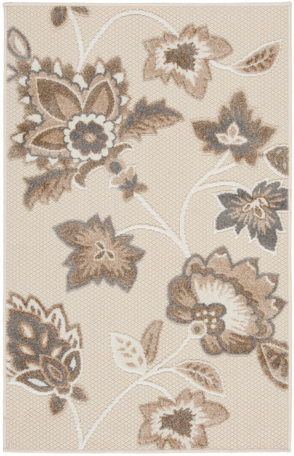 Beige rectangular rug with taupe, brown and ivory florals and vines; soft woven texture.