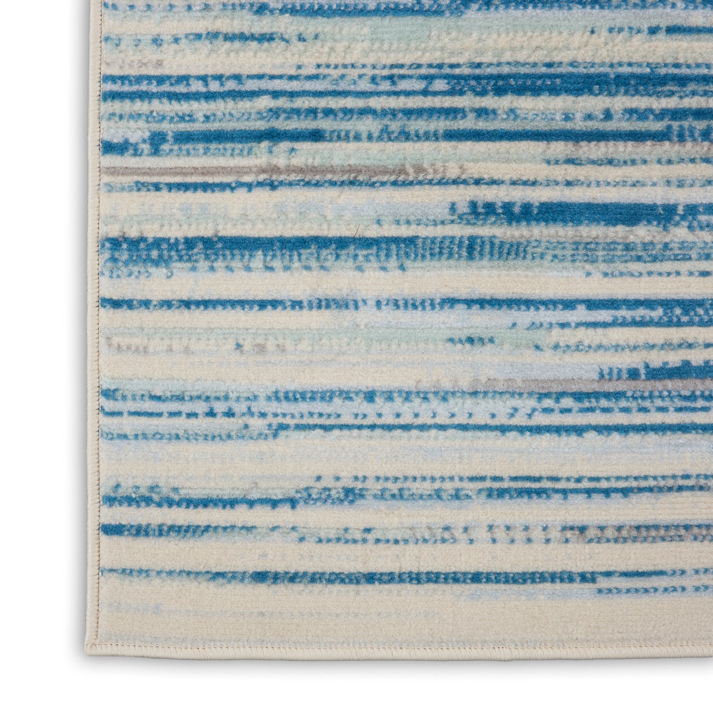 Rectangular cream woven rug with blue horizontal brushstroke stripes and subtle stitched border.