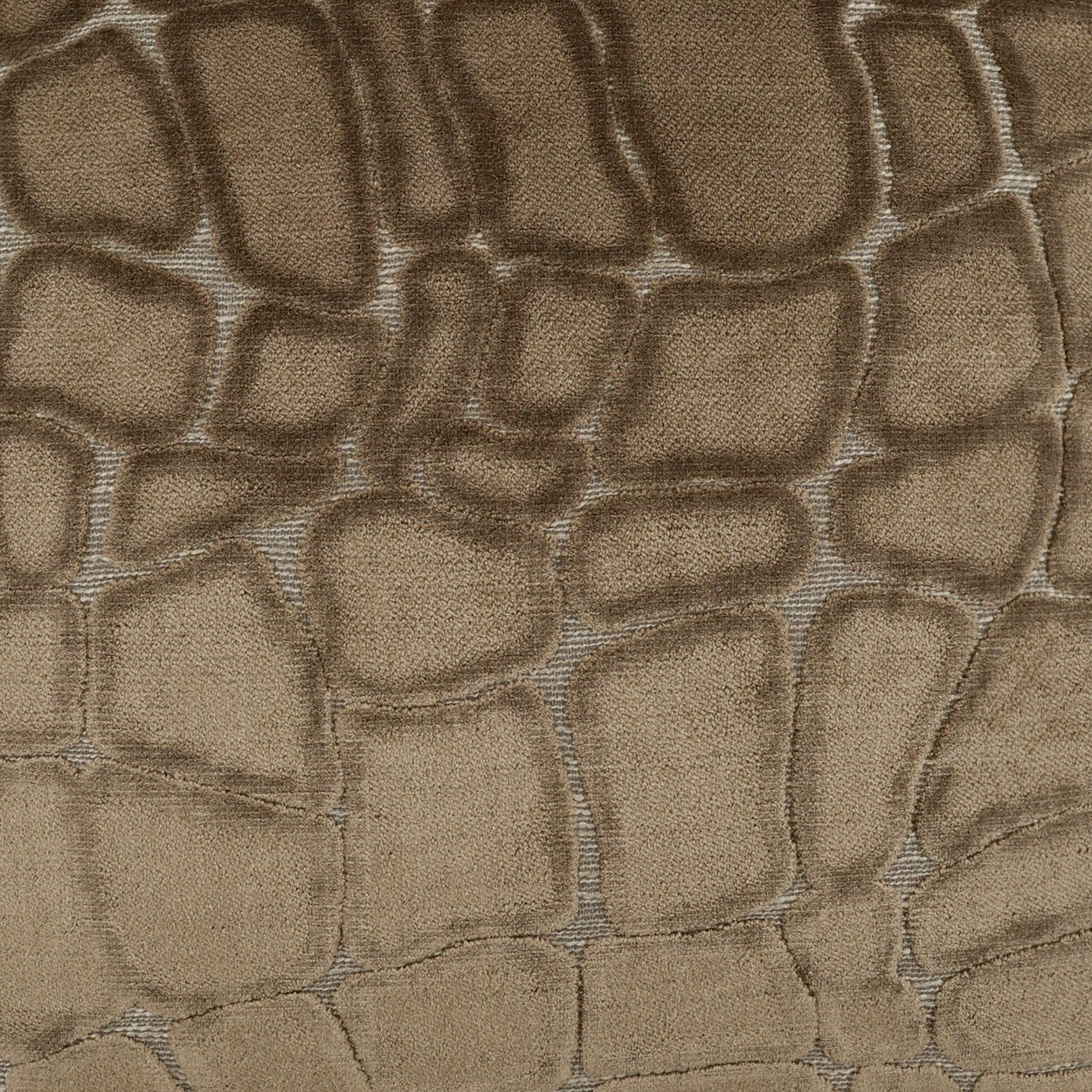 Tan faux crocodile-embossed fabric texture with chunky scale pattern; ideal for upholstery or bags.