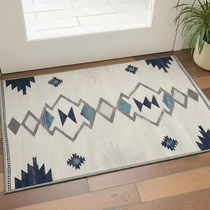 6' X 9' Blue and Ivory Southwestern Area Rug