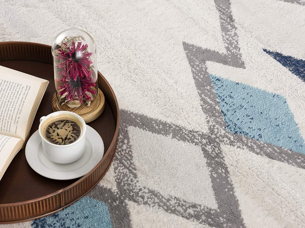 6' X 9' Blue and Ivory Southwestern Area Rug