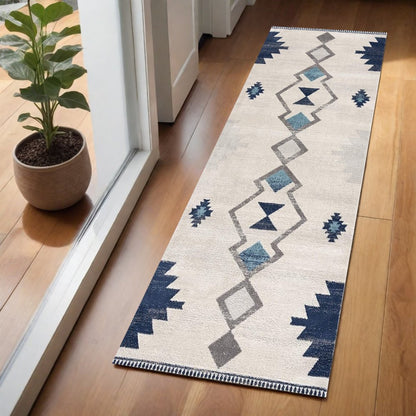 6' X 9' Blue and Ivory Southwestern Area Rug
