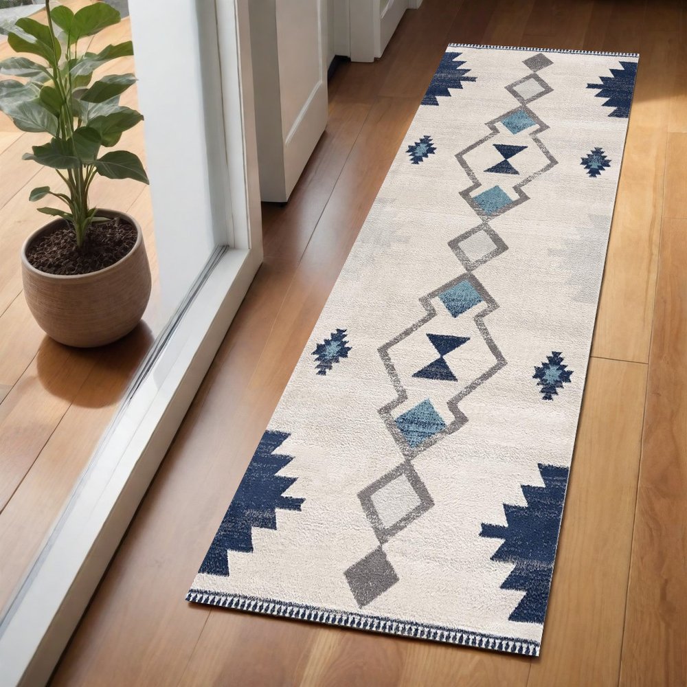 6' X 9' Blue and Ivory Southwestern Area Rug