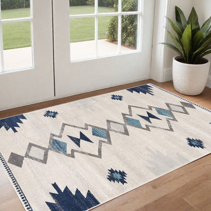 6' X 9' Blue and Ivory Southwestern Area Rug