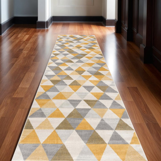 6' Yellow And Ivory Geometric Runner Rug