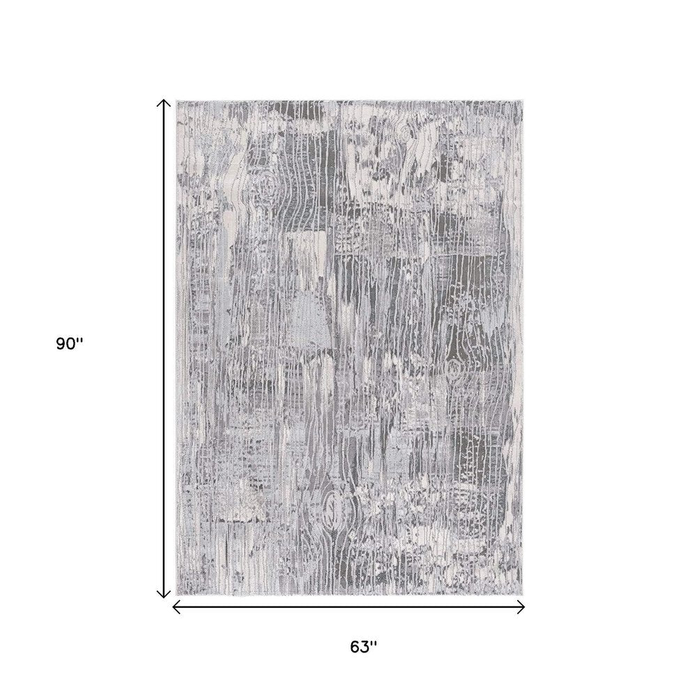 5' X 7' Blue Abstract Power Loom Area Rug