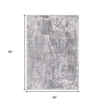 5' X 7' Blue Abstract Power Loom Area Rug