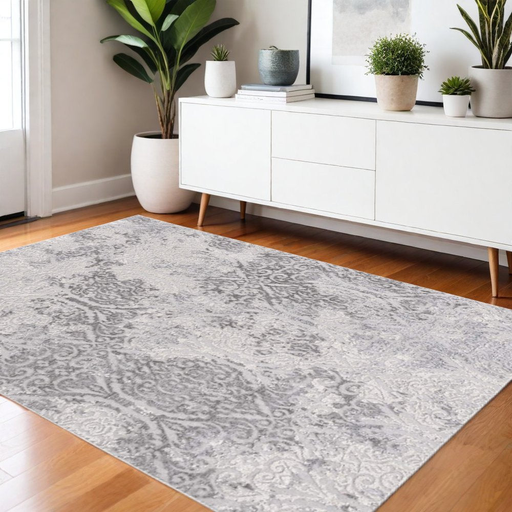 5' X 8' Gray And Ivory Damask Area Rug