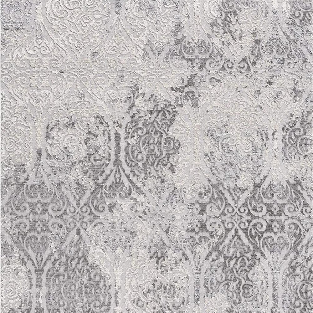 8' X 11' Cream And Gray Tinted Ogee Pattern Area Rug
