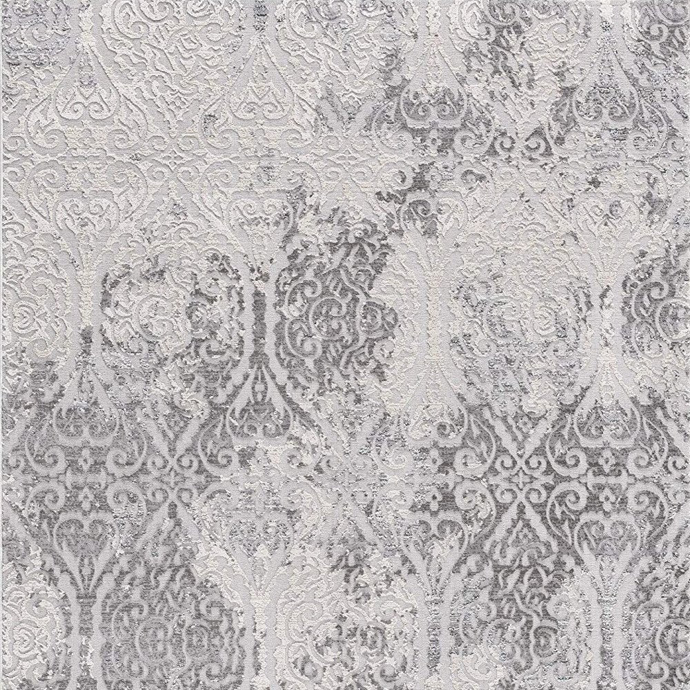 8' X 11' Cream And Gray Tinted Ogee Pattern Area Rug