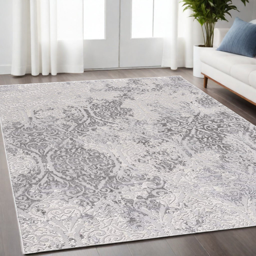 5' X 8' Cream And Gray Tinted Ogee Pattern Area Rug