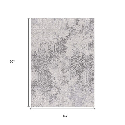 5' X 8' Cream And Gray Tinted Ogee Pattern Area Rug