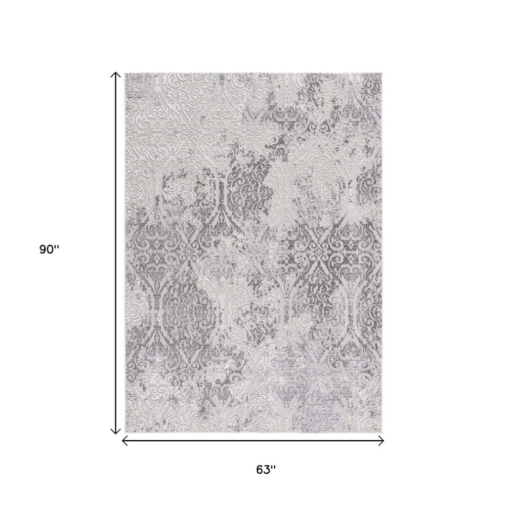 5' X 8' Cream And Gray Tinted Ogee Pattern Area Rug