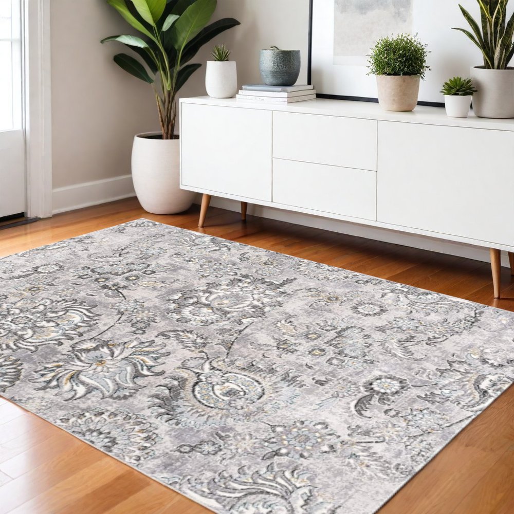 5' X 7' Gray And Ivory Floral Area Rug